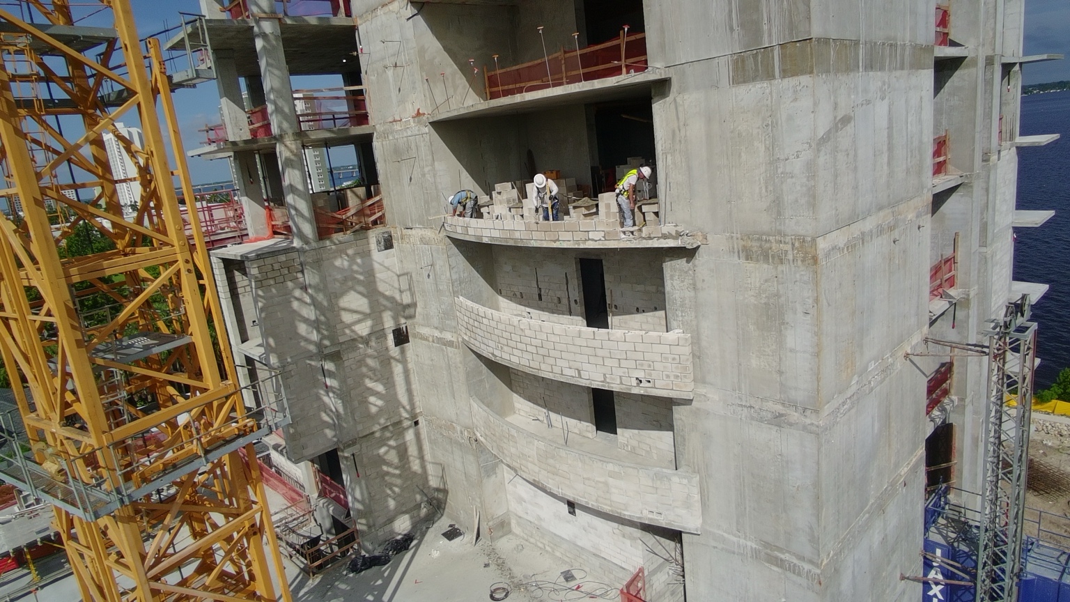 BSG Build Force crews installing block on the Fort Myers residential tower at floor seven